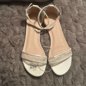 Brand new white sandals. Bought for wedding or bridal shower or rehearsal dinner